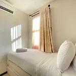 Cozy And Serene 2Br Apartment At Parahyangan Residence By Travelio